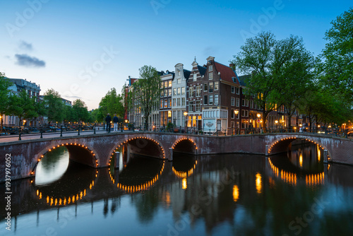 Bridges on Keizersgracht canal at dusk, Amsterdam, Netherlands