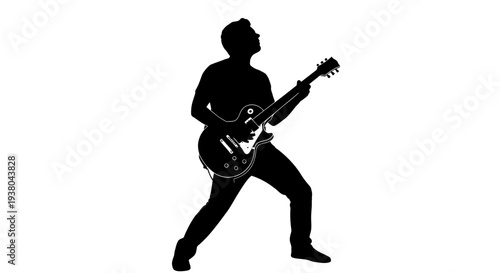 Man playing electric guitar dynamically.
