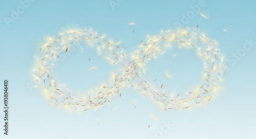 Two swirling circles of confetti against a gradient blue sky background