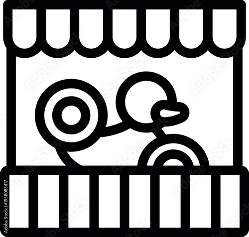 Plastic duck toy in a shooting gallery booth at an amusement park or funfair