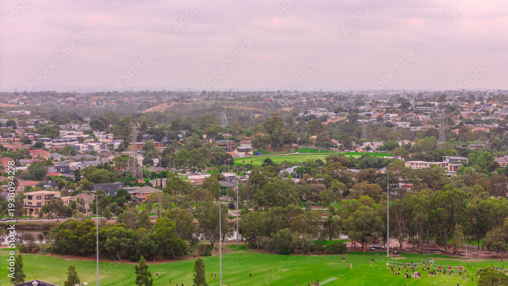 Obraz premium Panoramic Aerial Drone view of Inner Suburbs of Melbourne housing, roof tops, the streets and the parks, the roads and trees of Ascot Vale Moonee Ponds Brunswick Essendon and Maribyrnong in VIC Victor