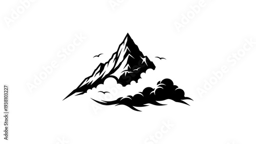 Majestic mountain peak silhouette with clouds and birds