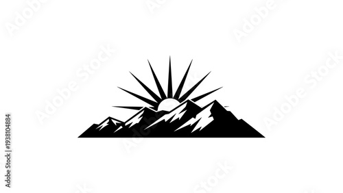 Mountain sunrise silhouette with radiating sunbeams