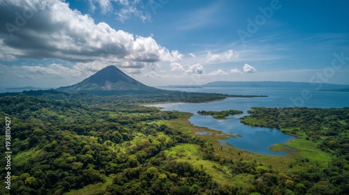 Wallpaper Mural Aerial volcano lake landscape with island, mountain, nature, water, sky, greenery  reflection. Majestic volcanic peak rising above serene lake surrounded by lush tropical forest under bright sunny sky Torontodigital.ca