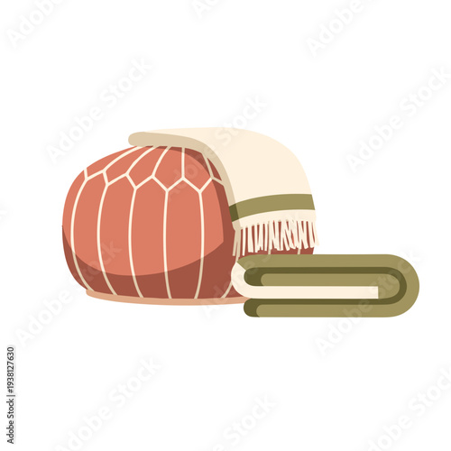 Cozy knitted pouf with soft blanket in warm color tones  