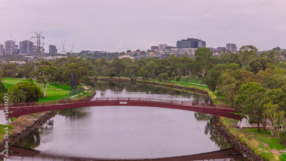 Fototapeta premium Panoramic Aerial Drone view of Inner Suburbs of Melbourne housing, roof tops, the streets and the parks, the roads and trees of Ascot Vale Moonee Ponds Brunswick Essendon and Maribyrnong in VIC Victor