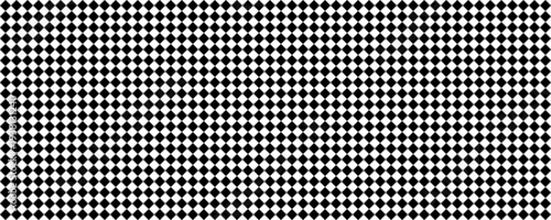 Seamless geometric pattern of a black and white checkerboard rotated at a 45-degree angle or rhombuses. Classic minimalist background for design and texturing.