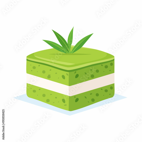 Green dessert slice with layered cake and leaves decoration
