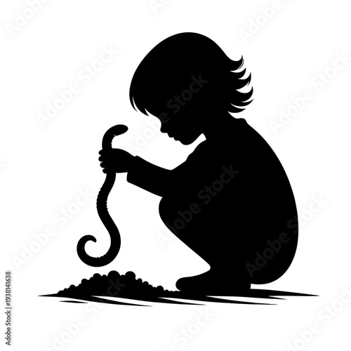 Child holding worm in garden soil silhouette