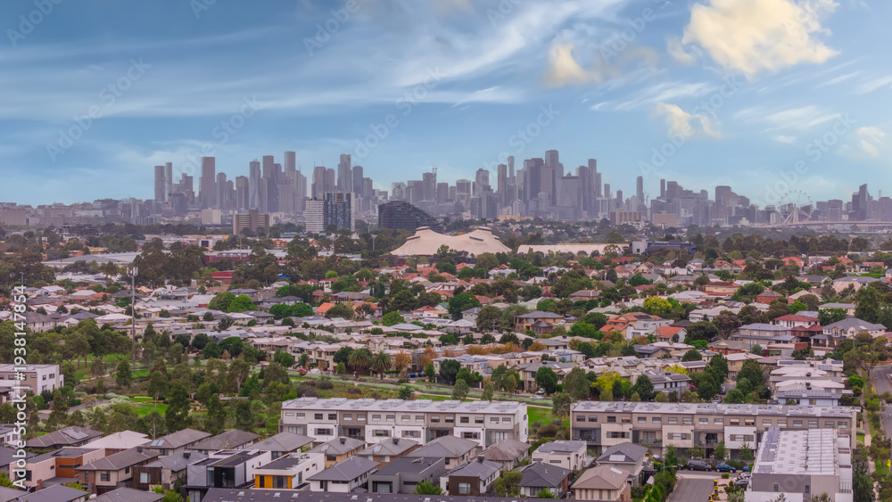 Fototapeta premium Panoramic Aerial Drone view of Inner Suburbs of Melbourne housing, roof tops, the streets and the parks, the roads and trees of Ascot Vale Moonee Ponds Brunswick Essendon and Maribyrnong in VIC Victor