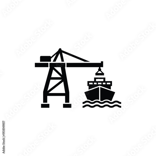 Crane lifting cargo ship at dockside viewed from the side in industrial harbor