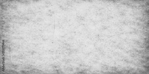 A vintage grey grunge paper texture features a dark rough surface pattern with marble and concrete cement details for a weathered old wall backdrop design