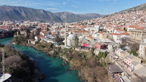 Drone aerial view of Stari Most (Old Bridge) and Koski Mehmed Pasha Mosque in Mostar, Bosnia and Herzegovina