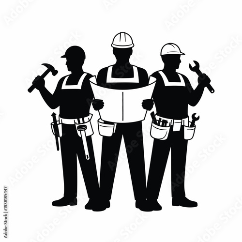 Three construction workers in hard hats and tool belts standing together with blueprints and tools