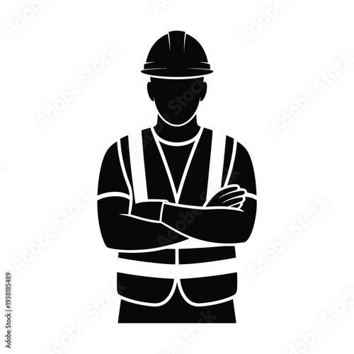 Construction worker in hard hat and safety vest with arms crossed standing confidently on site