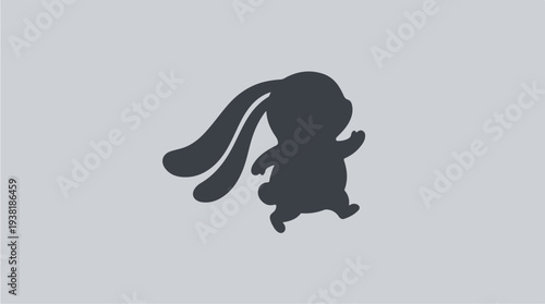 Cute cartoon bunny silhouette running happily.