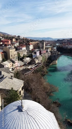 Drone aerial view of Stari Most (Old Bridge) and Koski Mehmed Pasha Mosque in Mostar, Bosnia and Herzegovina
