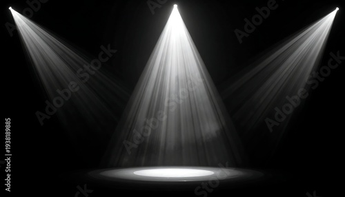 Three bright spotlights shine down onto a circular area on a stark black background, creating a dramatic effect