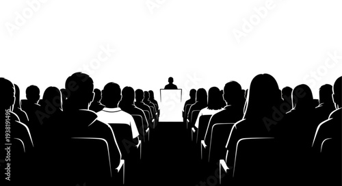 Silhouetted Audience Listening to Speaker.