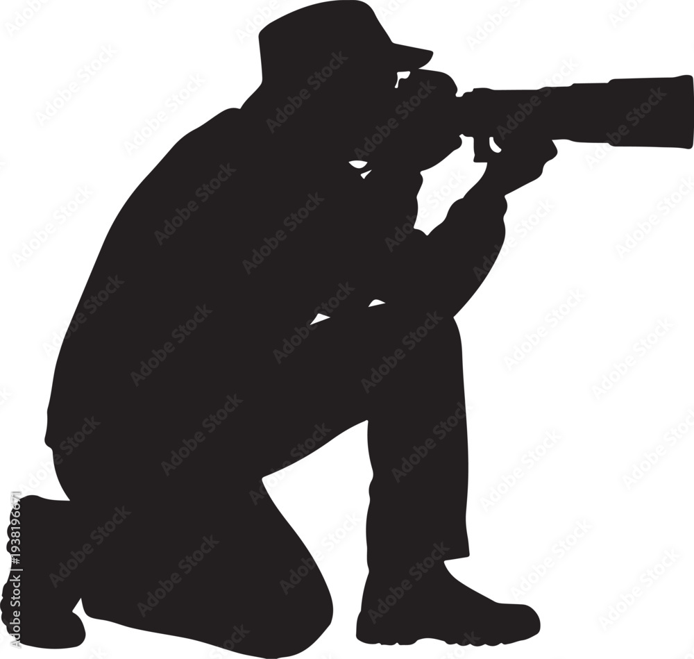 Naklejka premium Photographer Kneeling with Telephoto Camera Silhouette