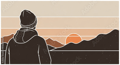 Man standing alone watching the sunset over mountains.