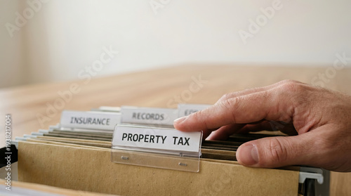 Wallpaper Mural Property tax finance document file folder hand office paperwork label organization neatly arranged property tax finance document file folder hand office paperwork label organization wooden Torontodigital.ca