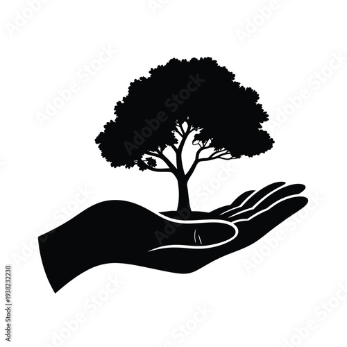 A black silhouette of a tree held gently within a protective hand