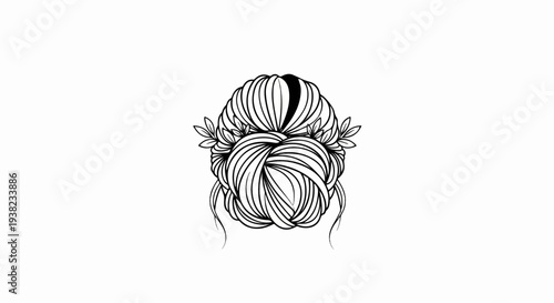 Elegant braided updo with delicate leaf accents