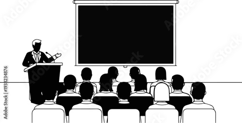 Speaker at podium presents to an audience in front of a large screen