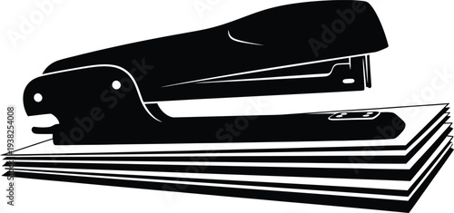 Black Stapler on Stack of Papers Isolated on White