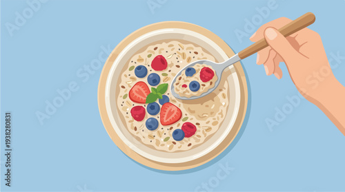 Healthy Oatmeal Bowl with Fresh Berries and Spoon.