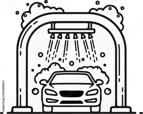 A car undergoing a soapy wash at an automated drive-through service