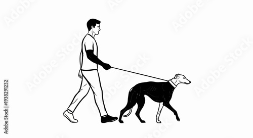 Man walking a black dog on a leash
