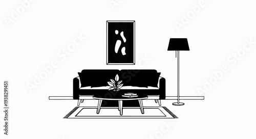 Minimalist living room with a dark couch, coffee table, rug, lamp, and art