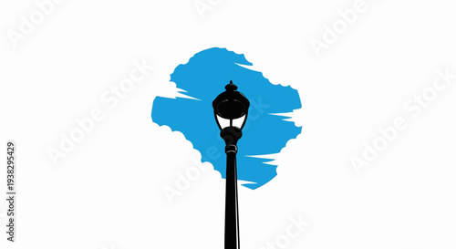 Black lamppost silhouetted against abstract blue sky