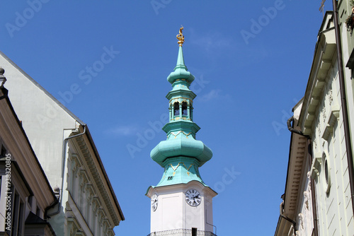 Photography Michael's Gate Tower Bratislava August 2024 Historic white gateway with green sp