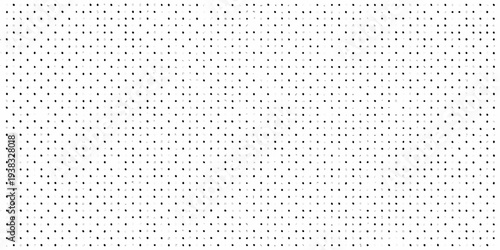 Dense pattern of small black dots on a bright white background