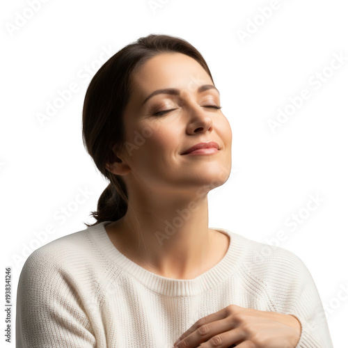 Woman in white sweater meditating with eyes closed and hand on chest, isolated on white background