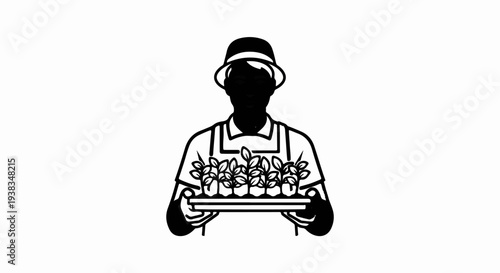 Person in hat and apron holds tray of seedlings