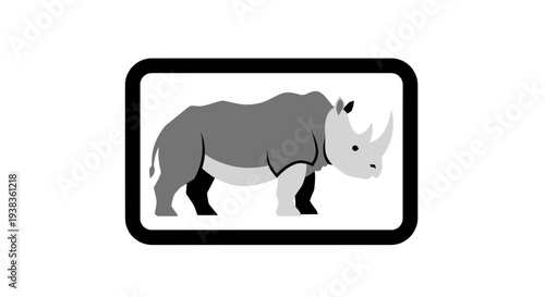 Rhinoceros in profile view standing still.