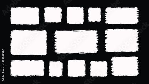 A black and white image of a grid of rectangles with rough edges