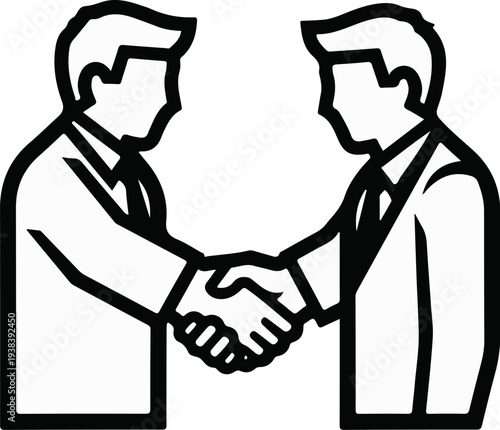 Two men in suits shaking hands in agreement