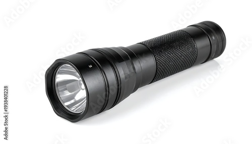 Black cylindrical flashlight with textured grip on white