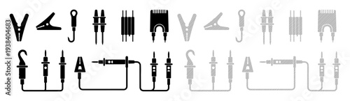 Collection of electrical testing probes and clips in black and gray