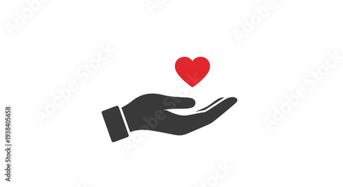 Hand holding a red heart symbol.