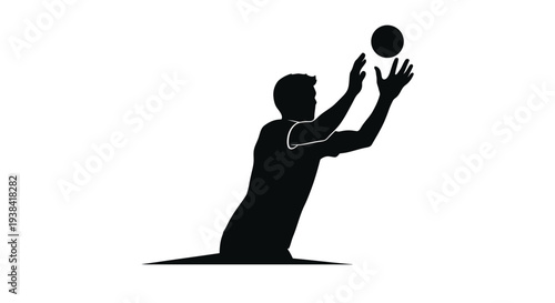 A basketball player reaching for the ball in a dramatic pose silhouette