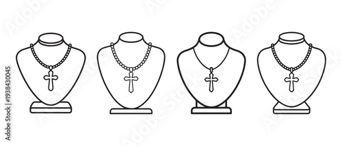 Collection of Christian Cross Necklaces on Display Busts, Elegant Religious Jewelry Line Art Icons.
