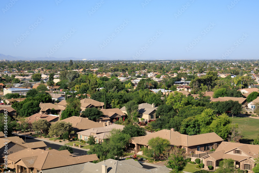 Obraz premium Aerial view of North-West Phoenix, Glendale and Peoria, a part of Valley of the Sun, from the top of Vision Hills, Arizona
