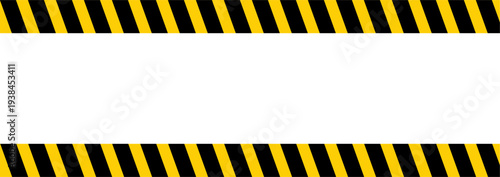Caution tape bordering a restricted area with diagonal yellow and black stripes on a plain surface from a straight-on viewpoint