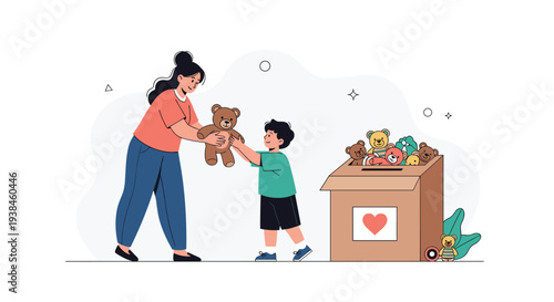Mother helps her young son donate old teddy bears and toys into a cardboard charity box to support children in need.